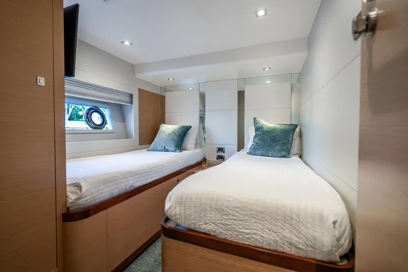 Mocean Yacht Photos Pics Luxurious twin cabin in 2021 Ocean Alexander 70E Motoryacht, featuring modern design and comfort.