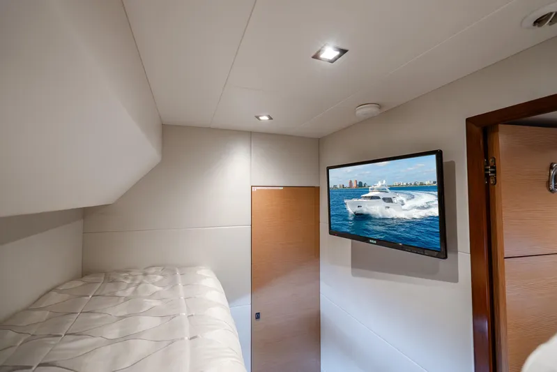 Mocean Yacht Photos Pics Interior cabin of 2021 Ocean Alexander 70E Motoryacht with TV and bunk bed.