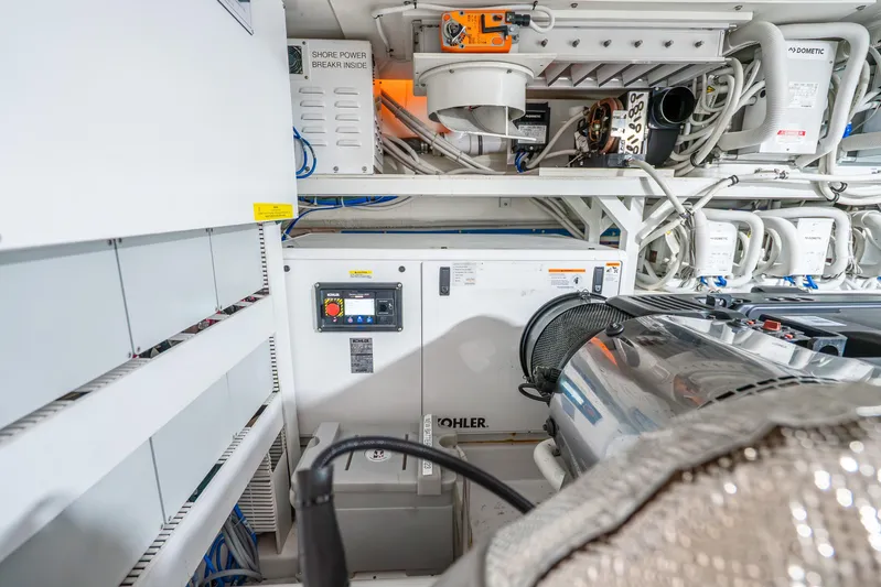 Mocean Yacht Photos Pics Engine room of 2021 Ocean Alexander 70E Motoryacht with Kohler generator and electrical systems.