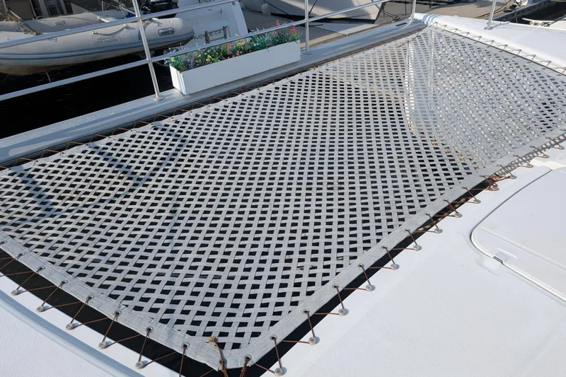 Grasshopper Yacht Photos Pics Trampoline net on 2011 Fountaine Pajot Orana 44 Grand Large catamaran deck.