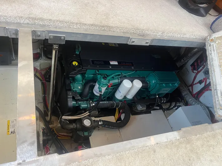  Yacht Photos Pics Engine compartment of 2006 Carver 430 Cockpit Motor Yacht, showcasing mechanical components.