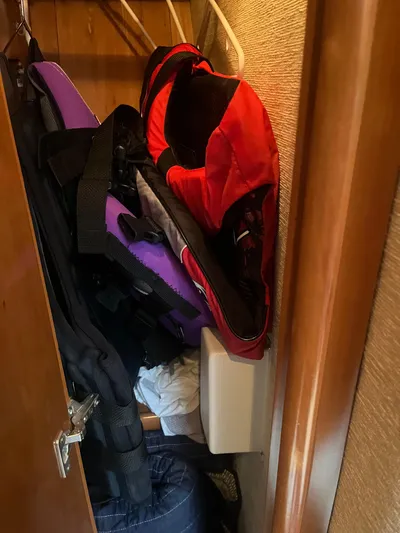  Yacht Photos Pics Life jackets stored in a closet on a 2006 Carver 430 Cockpit Motor Yacht.