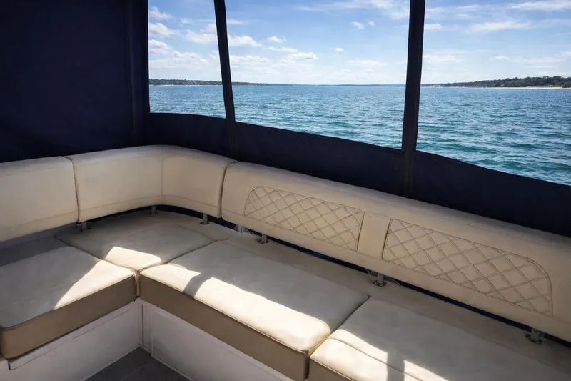  Yacht Photos Pics Luxurious seating on 2019 Regal 42 Grande Coupe yacht with ocean view.