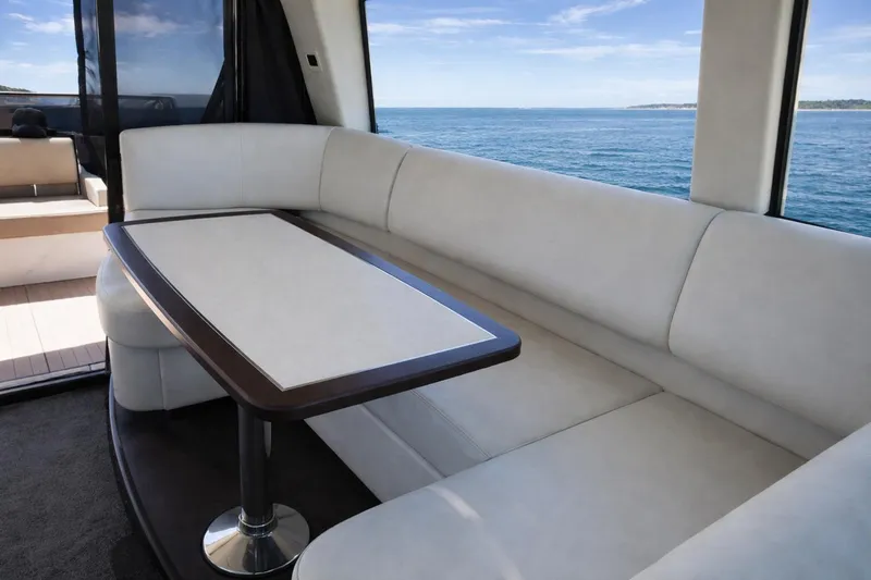  Yacht Photos Pics Luxurious interior of 2019 Regal 42 Grande Coupe yacht with ocean view.