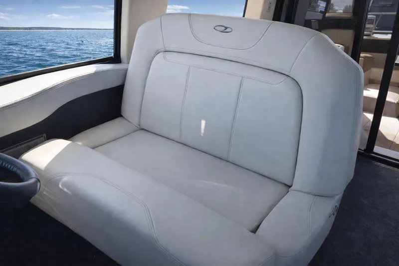 Yacht Photos Pics Luxurious seating inside 2019 Regal 42 Grande Coupe yacht with ocean view.