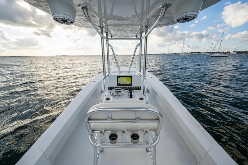  Yacht Photos Pics 2022 Conch 25 boat on open water, featuring modern navigation equipment.