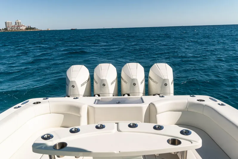  Yacht Photos Pics 2022 SeaVee 390Z boat with four Mercury engines on open ocean.