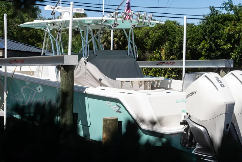  Yacht Photos Pics 2022 SeaVee 390Z boat docked with twin Mercury engines.
