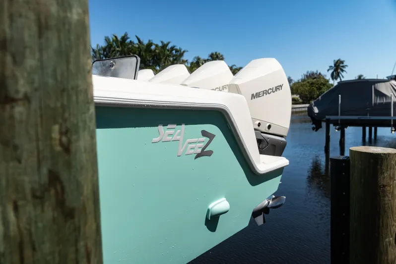  Yacht Photos Pics 2022 SeaVee 390Z boat with Mercury engines docked by water.