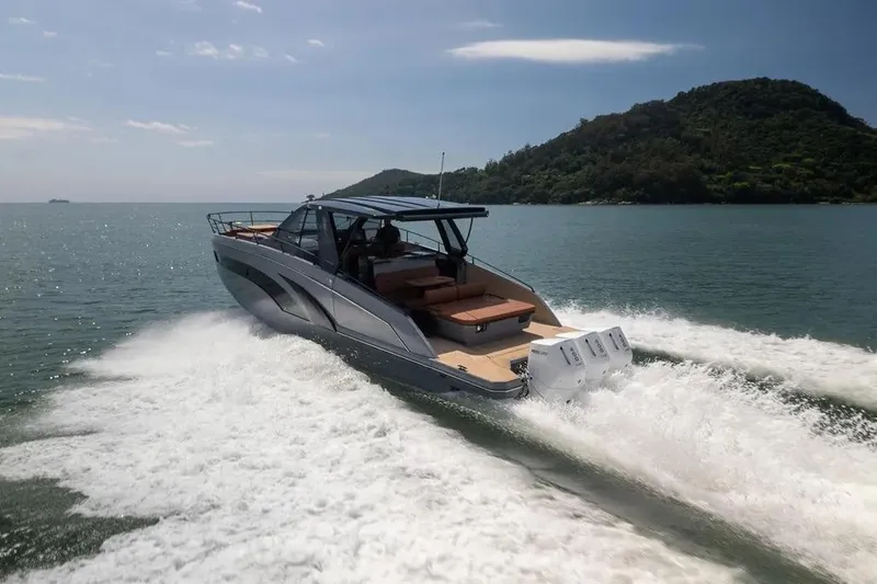  Yacht Photos Pics 2025 Hanover 447 Ultimate Luxury Edition yacht cruising on open water.