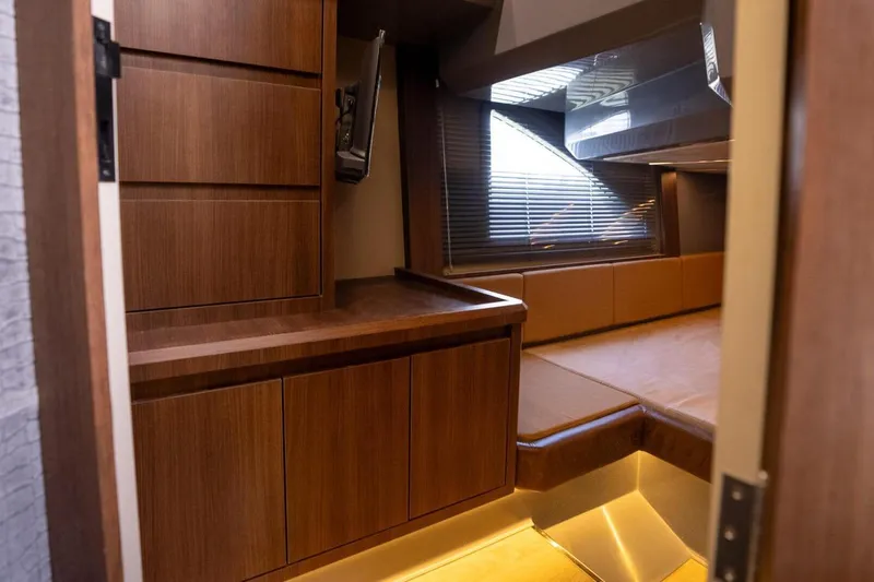  Yacht Photos Pics Luxurious interior of 2025 Hanover 447 Ultimate Luxury Edition yacht with wood finishes.