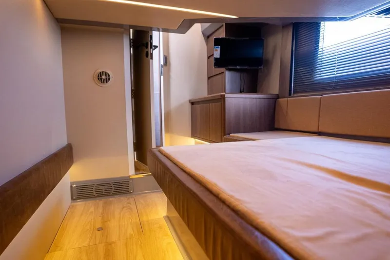  Yacht Photos Pics Luxurious interior of 2025 Hanover 447 Ultimate Luxury Edition yacht, featuring elegant wood finishes.