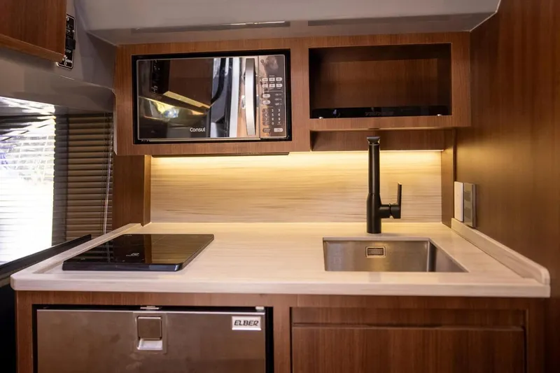  Yacht Photos Pics Luxurious kitchen interior of 2025 Hanover 447 Ultimate Luxury Edition RV.