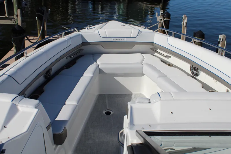  Yacht Photos Pics 2023 Formula 330 Crossover Bowrider with spacious seating at the dock.