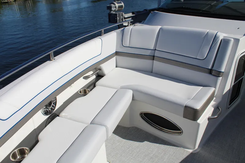  Yacht Photos Pics 2023 Formula 330 Crossover Bowrider interior with luxurious seating and cup holders.
