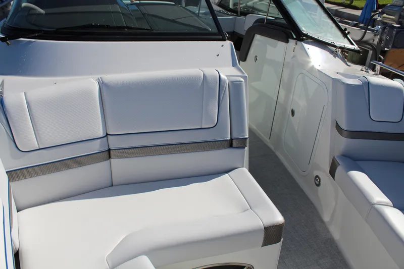  Yacht Photos Pics 2023 Formula 330 Crossover Bowrider interior with white seating and sleek design.