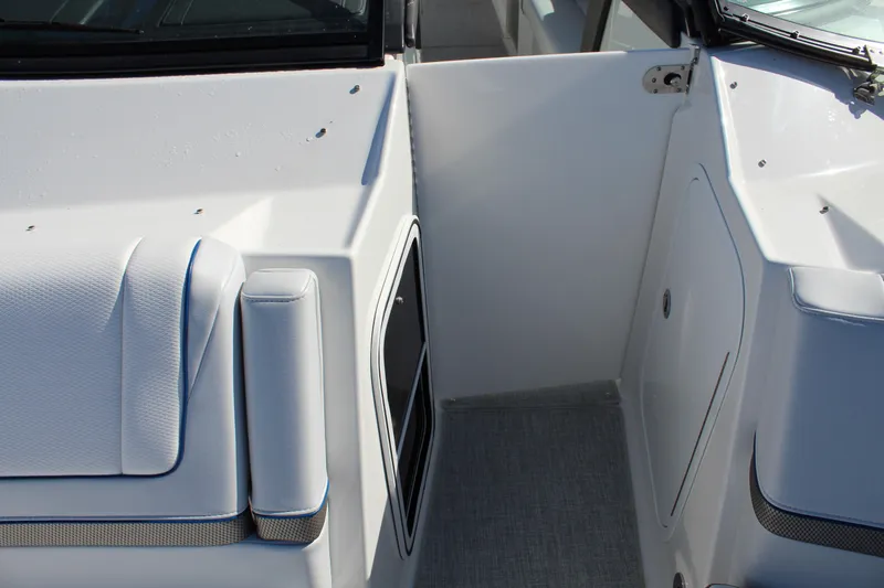  Yacht Photos Pics 2023 Formula 330 Crossover Bowrider interior, featuring sleek white seating and modern design.
