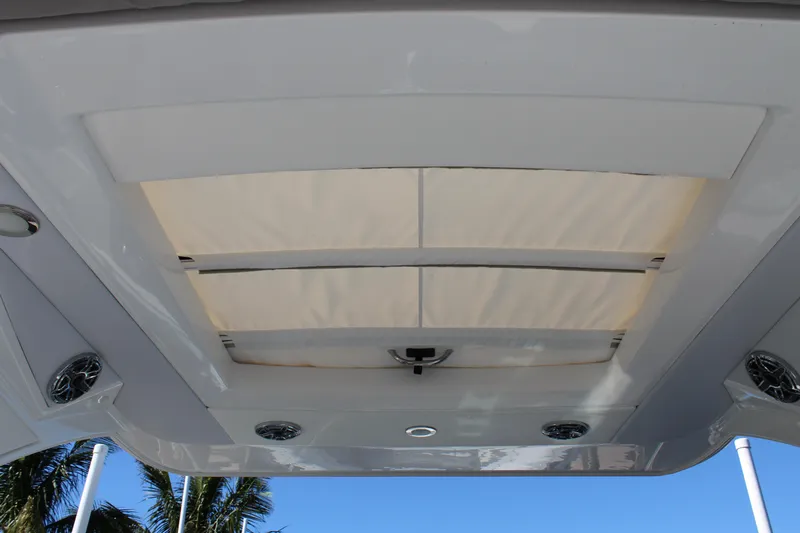  Yacht Photos Pics 2023 Formula 330 Crossover Bowrider sunroof with integrated speakers and sleek design.