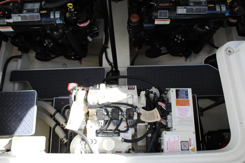  Yacht Photos Pics Engine compartment of 2023 Formula 330 Crossover Bowrider, showcasing mechanical components.