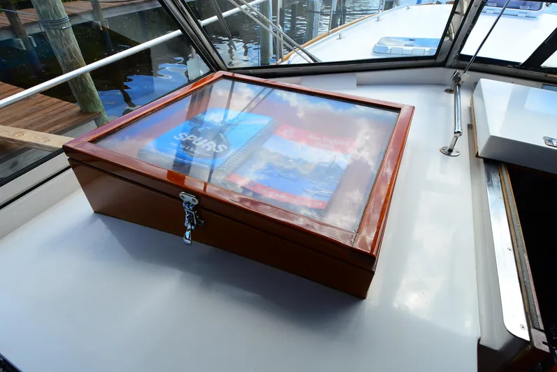  Yacht Photos Pics Wooden display box on 1994 Grand Banks 38 Eastbay boat deck, containing nautical charts.
