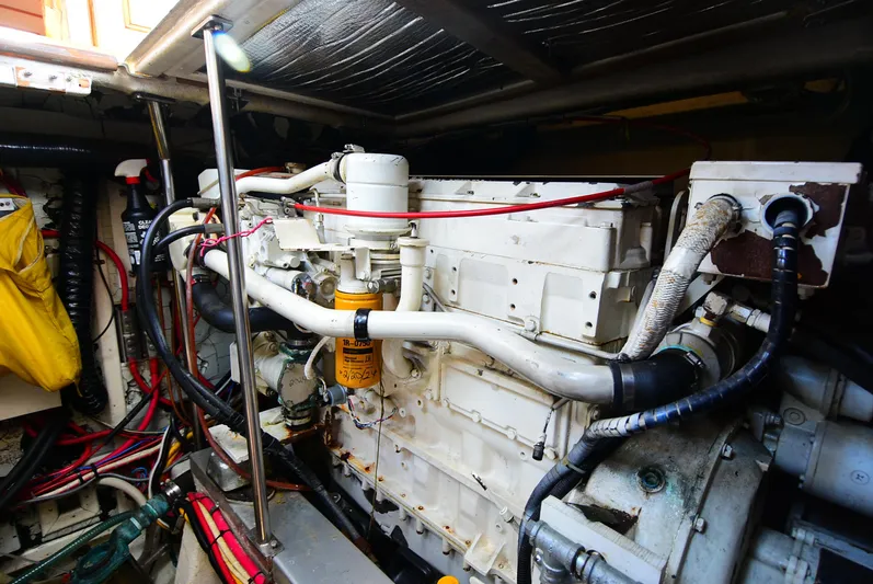  Yacht Photos Pics Engine room of 1994 Grand Banks 38 Eastbay, showcasing complex machinery and wiring.