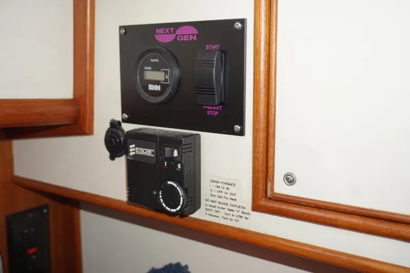  Yacht Photos Pics Control panel on 1994 Grand Banks 38 Eastbay boat, featuring Next Gen and Espar systems.