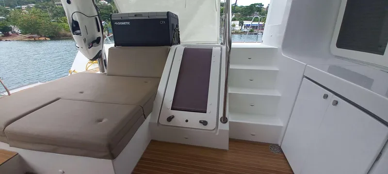 Amea Yacht Photos Pics Luxurious Lagoon 52 F yacht interior with seating, stairs, and storage, 2014 model.