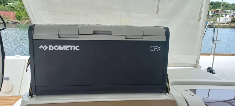 Amea Yacht Photos Pics Dometic CFX cooler on Lagoon 52 F yacht, 2014 model, docked by the water.