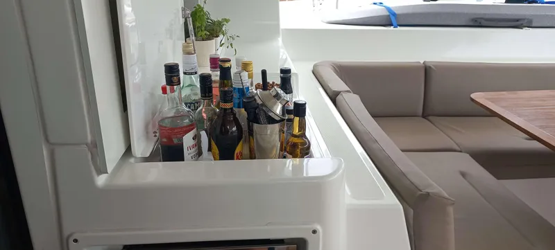 Amea Yacht Photos Pics Luxurious Lagoon 52 F yacht interior with bar and seating area, 2014 model.