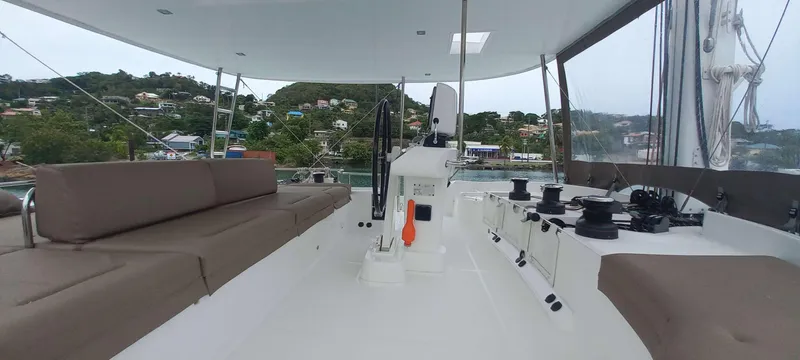 Amea Yacht Photos Pics Spacious deck of 2014 Lagoon 52 F catamaran with seating and control area.