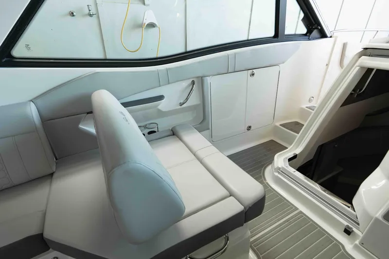  Yacht Photos Pics 2023 Sea Ray Sundancer 320 Coupe interior with sleek seating and modern design.