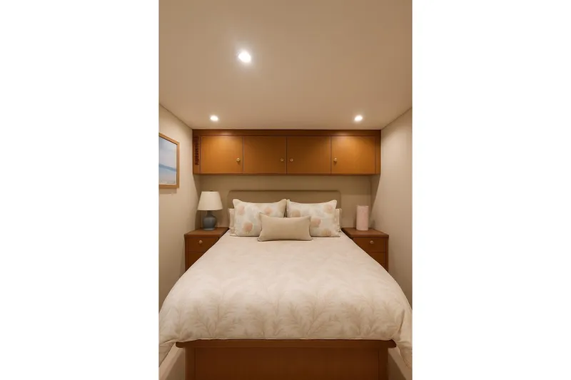 Never Been Fished Yacht Photos Pics Luxurious bedroom interior of 2002 Ocean Yachts 52 SS with cozy bedding and wooden cabinets.