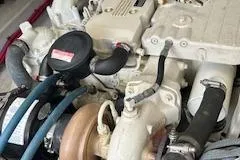  Yacht Photos Pics Engine of 2005 Hunt Yachts Surfhunter 33 with visible hoses and components.