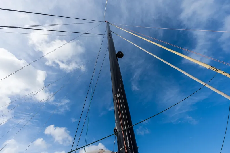 Orion Yacht Photos Pics Mast of Catana 90 sailboat against a blue sky, 2008 model.