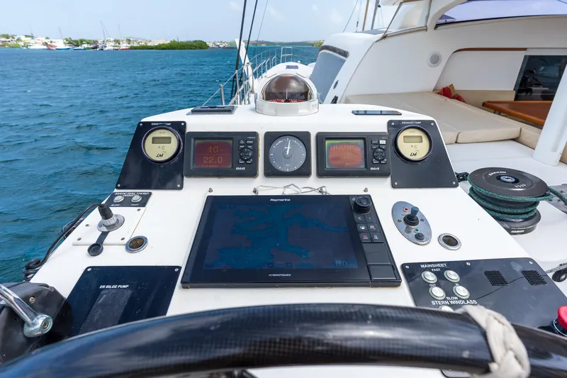 Orion Yacht Photos Pics Cockpit of 2008 Catana 90 yacht with navigation instruments and ocean view.