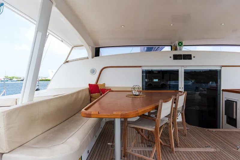 Orion Yacht Photos Pics Luxurious Catana 90 yacht interior with elegant seating and dining area, 2008 model.