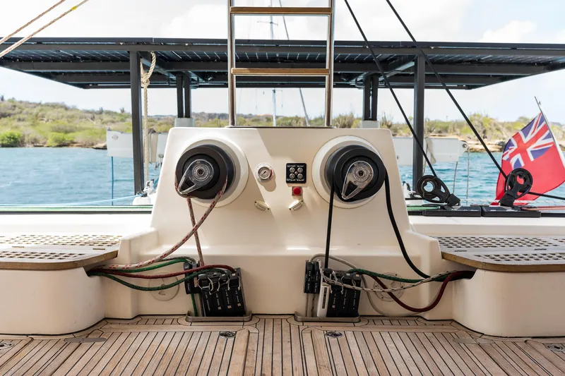 Orion Yacht Photos Pics Catana 90 yacht deck with winches and ropes, featuring a British flag, 2008 model.