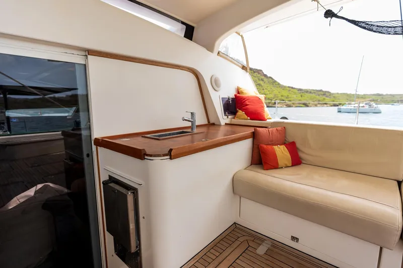 Orion Yacht Photos Pics Luxurious Catana 90 yacht interior with seating and sink, 2008 model.