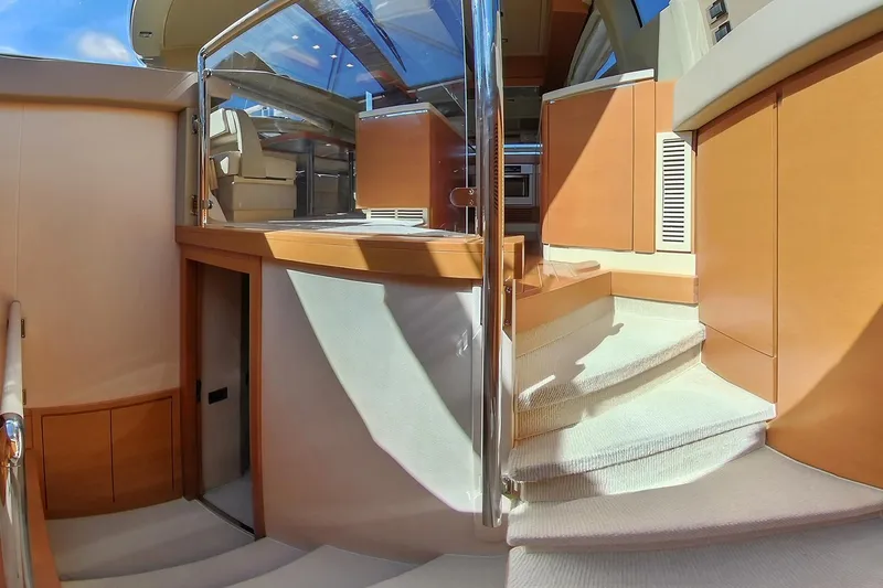 Elena I Yacht Photos Pics Interior of 2013 Azimut 64 yacht, featuring elegant wooden finishes and modern design.