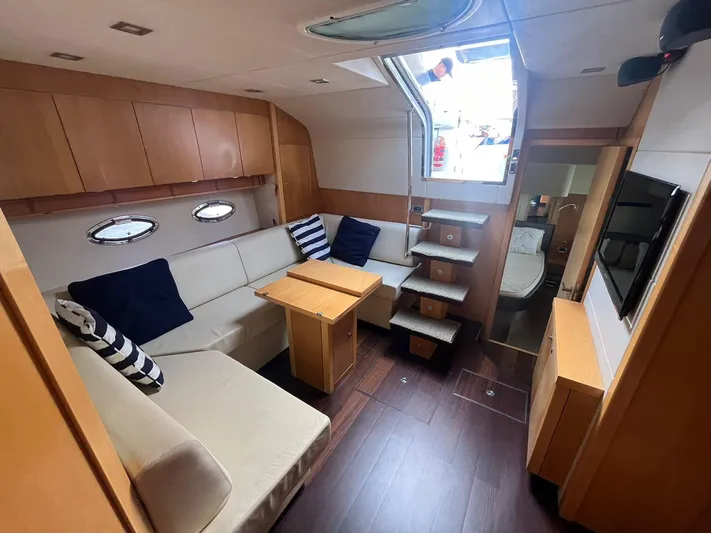 Yacht Photos Pics Luxurious interior of 2011 Sunseeker Portofino 48 yacht with modern furnishings and elegant design.