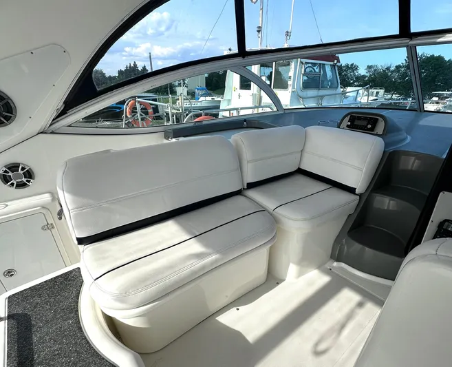  Yacht Photos Pics 2006 Cruisers Yachts 420 Express interior with white seating and large windows.