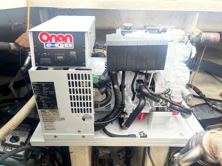  Yacht Photos Pics Engine compartment of 2006 Cruisers Yachts 420 Express with Onan generator.