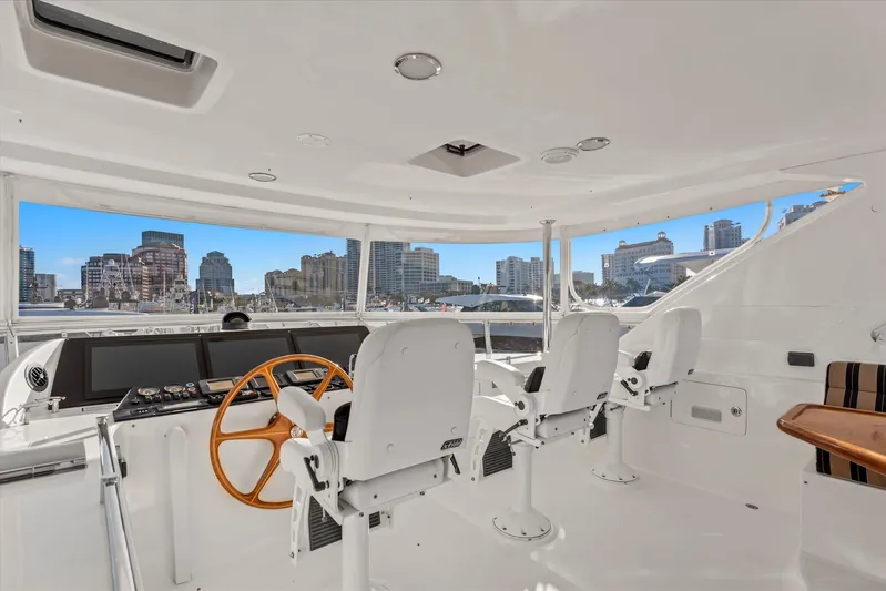 Miss Patti Yacht Photos Pics 2008 Ocean Alexander 74 Motoryacht helm with city skyline view.