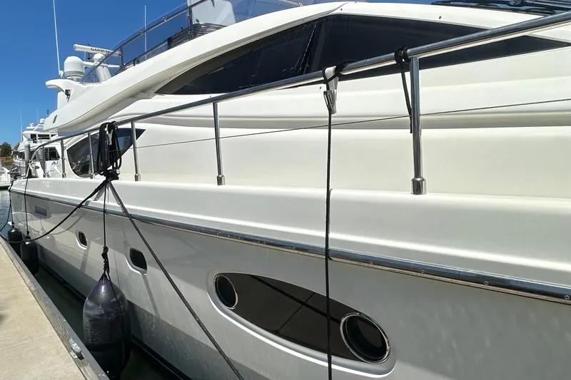 Mi Amore Yacht Photos Pics 2006 Ferretti Yachts 550 docked, showcasing sleek design and luxury features.
