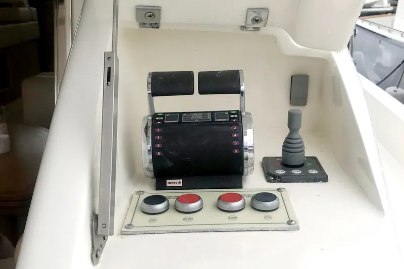 Mi Amore Yacht Photos Pics Control panel of a 2006 Ferretti Yachts 550, featuring throttle and joystick controls.