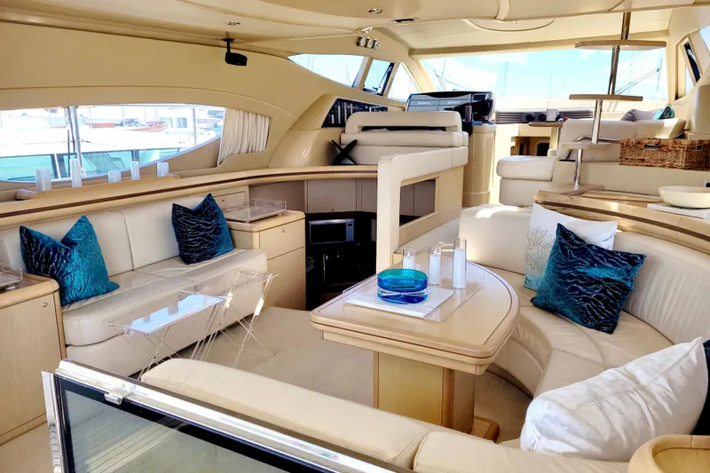 Mi Amore Yacht Photos Pics Luxurious interior of 2006 Ferretti Yachts 550 with elegant seating and decor.