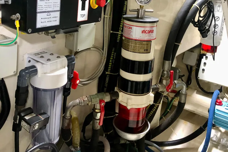 Mi Amore Yacht Photos Pics Engine room of 2006 Ferretti Yachts 550, showcasing fuel filtration system and components.