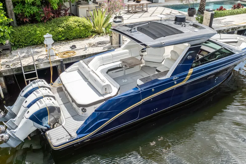  Yacht Photos Pics 2019 Sea Ray SLX 400 Outboard luxury boat docked, featuring sleek design and spacious seating.