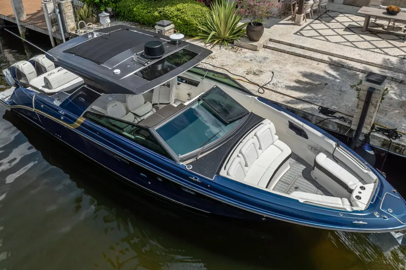  Yacht Photos Pics 2019 Sea Ray SLX 400 Outboard luxury boat docked, featuring sleek design and spacious seating.