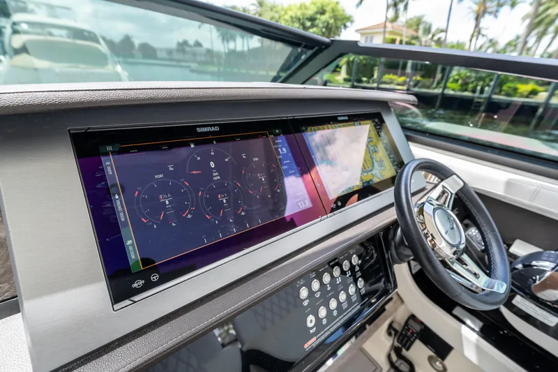 Yacht Photos Pics 2019 Sea Ray SLX 400 Outboard dashboard with advanced navigation display and controls.